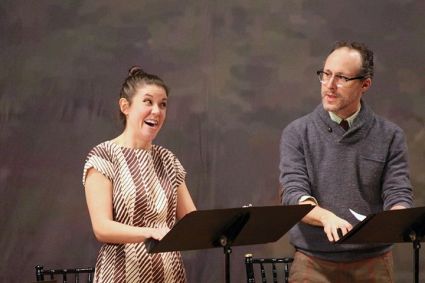 Photo by Lloyd Mulvey shows actors Gibson Frazier (playing Anton) and Zoe Winters (playing Alina) in the Pearl Theatre’s staged reading of Oded Gross’s The Government Inspector, January 2015; directed by Lucie Tiberghien.
